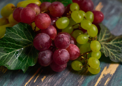 Close-up of grapes on table