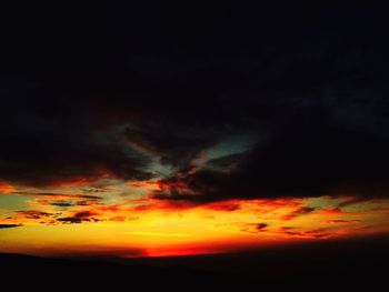 Scenic view of dramatic sky during sunset