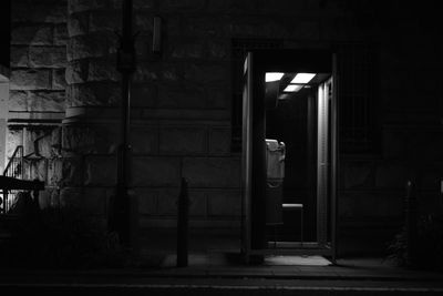 Telephone booth by roadside