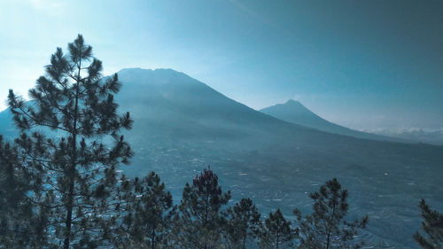 Scenic view of mountains against sky during winter