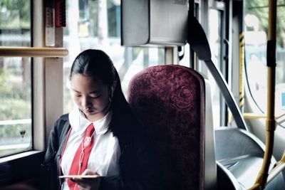 Girl sitting in bus