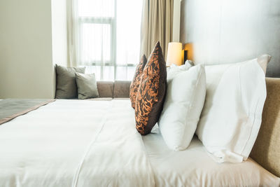 Close-up of bed in bedroom