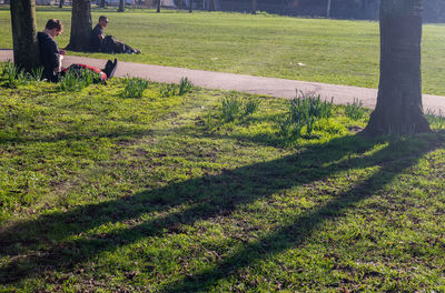 Shadow of people on field