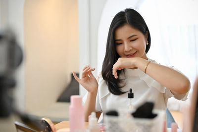 Young woman using mobile phone