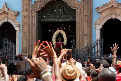 Hundreds of catholics and members of candomblé are seen paying homage to saint barbara 