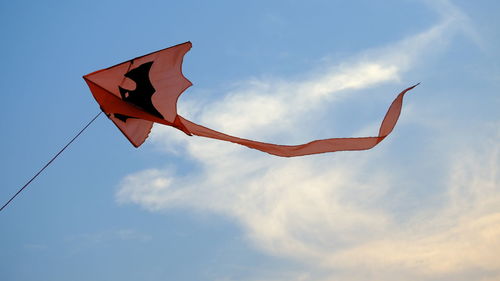 Low angle view of flag against sky