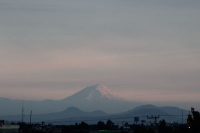 Scenic view of mountains against sky during sunset