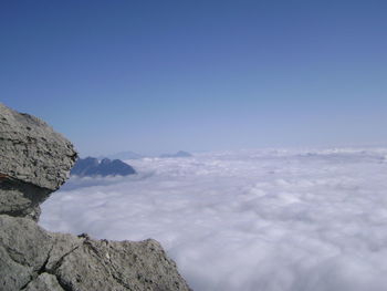 Scenic view of mountain peak and clouds