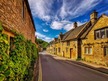 A sunny morning at the small idyllic village of castle combe of wiltshire, uk.