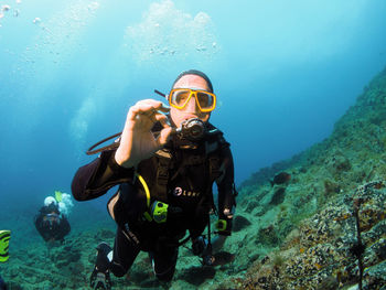 Man swimming in sea