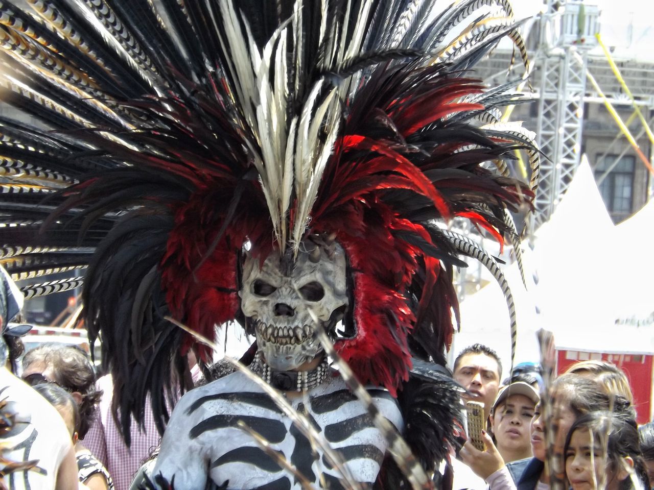 group of people, celebration, real people, costume, women, people, day, crowd, arts culture and entertainment, feather, men, mask, outdoors, disguise, lifestyles, traditional festival, leisure activity, mask - disguise, festival, carnival - celebration event