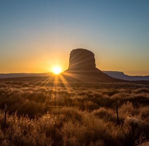 Scenic view of landscape at sunset