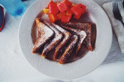 High angle view of french toast and fruits in plate