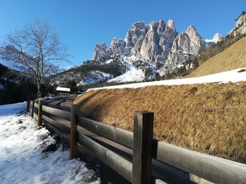 Scenic view of snowcapped mountains against clear sky