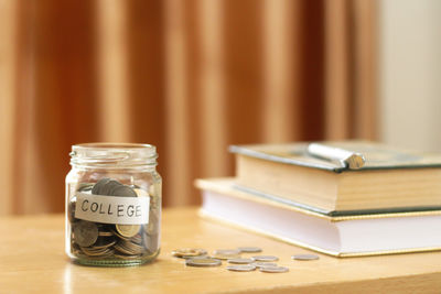 Close-up of coins on table