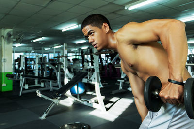 Man exercising in gym