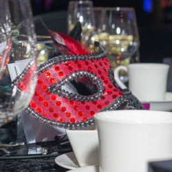 Close-up of red and drink in tray