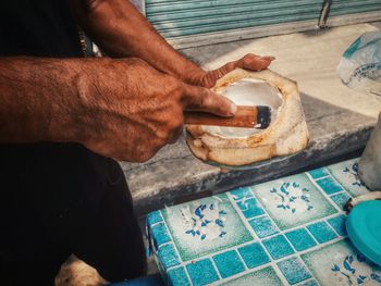 High angle view of man preparing food