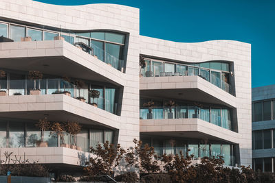 Low angle view of building against blue sky