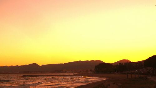 Scenic view of sea at sunset