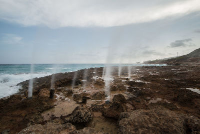 Water spraying by beach