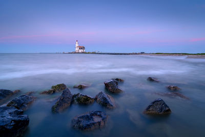 View of lighthouse in sea