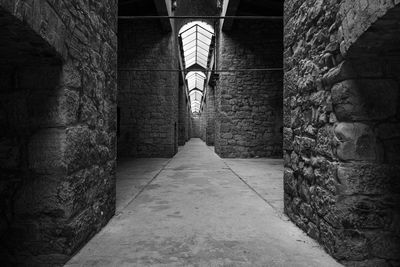 Empty alley amidst buildings