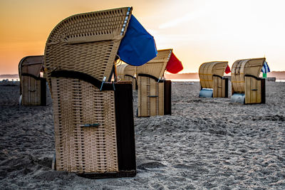 Hooded chairs on beach