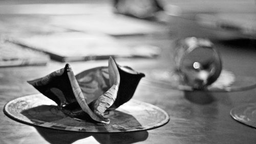 Close-up of paper on table