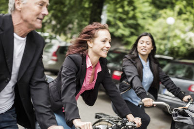 Business people commuting on bicycles