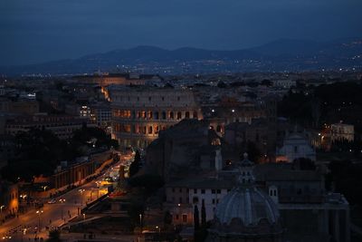 High angle view of illuminated buildings at night