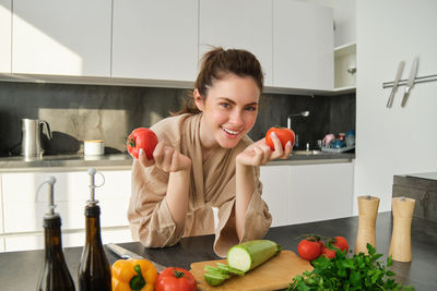 Portrait of boy preparing food at home