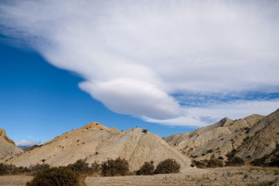 Scenic view of desert against sky