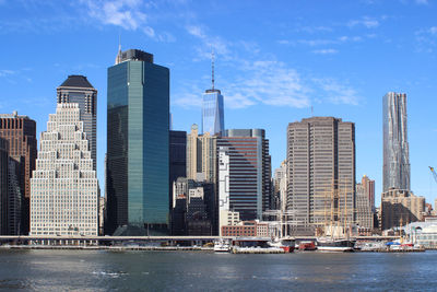 Modern buildings in city against sky