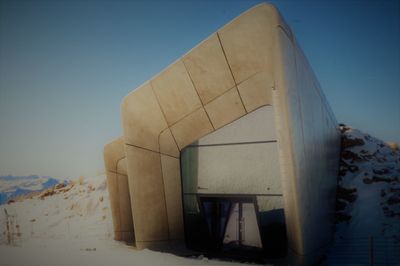 Built structure against clear sky during winter