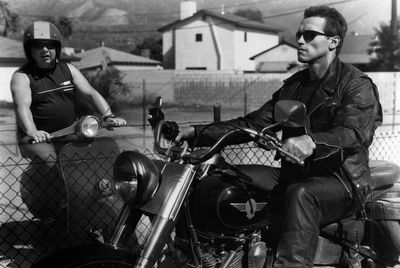 Young men sitting in car