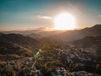 Scenic view of mountains against sky during sunset