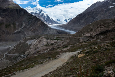 Scenic view of mountain range with valley