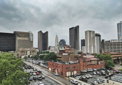 Buildings in city against sky