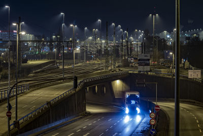 Truck on road at night