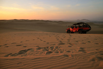 Scenic view of desert during sunset