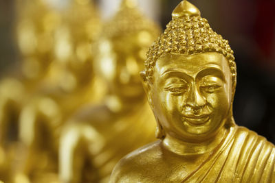 Close-up of buddha statues