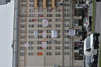 Traffic on road against buildings in city