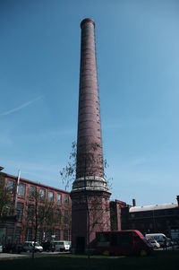 Low angle view of built structure against blue sky