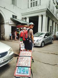 Woman looking at city street