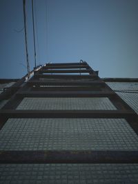 Brick wall against clear sky