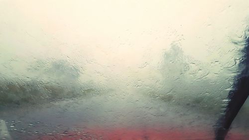 Full frame shot of wet glass window