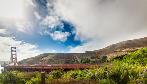 View of bridge over landscape against sky