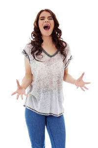 Portrait of a young woman against white background