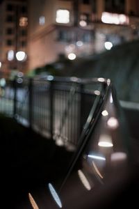 Close-up of illuminated bridge at night